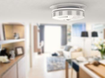 Photoelectric interconnected smoke alarm installed in kitchen