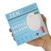ZEN photoelectric smoke alarms (1-pack box) being held by hand