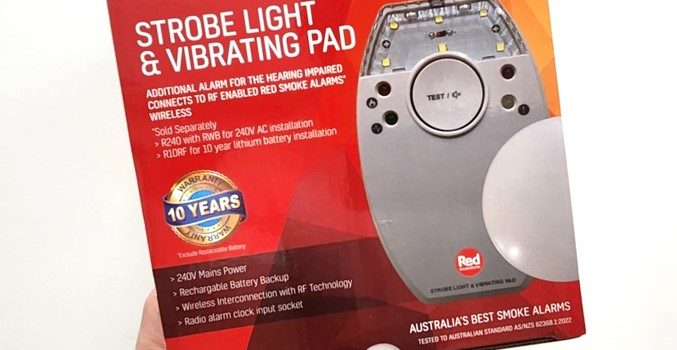 Red smoke alarm strobe light and vibrating pad model RHIS