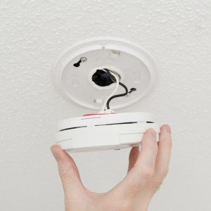 hard wired fire alarm vs wireless battery alarms